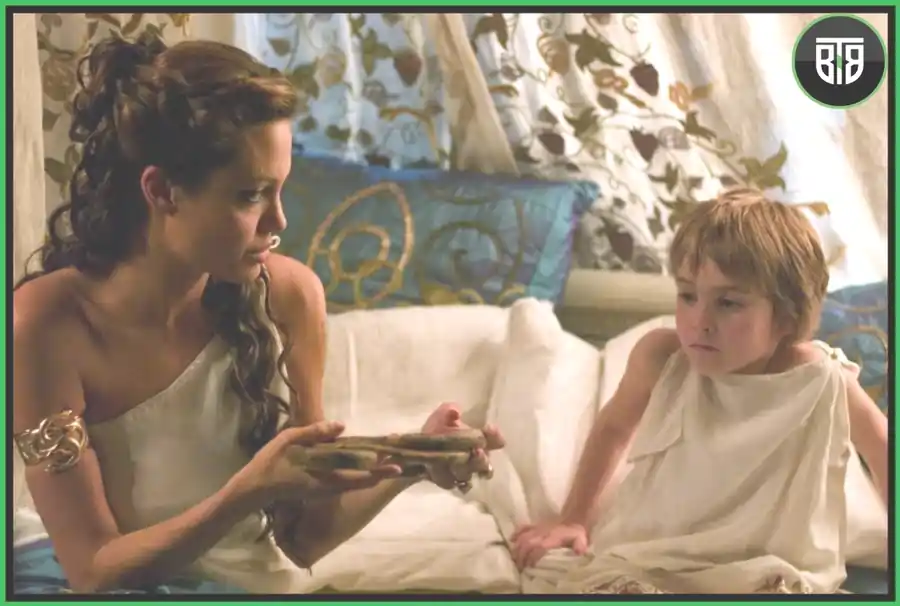 a lady is feeding a kid in Alexander Veliko (2004), Who is the Best War Movie?