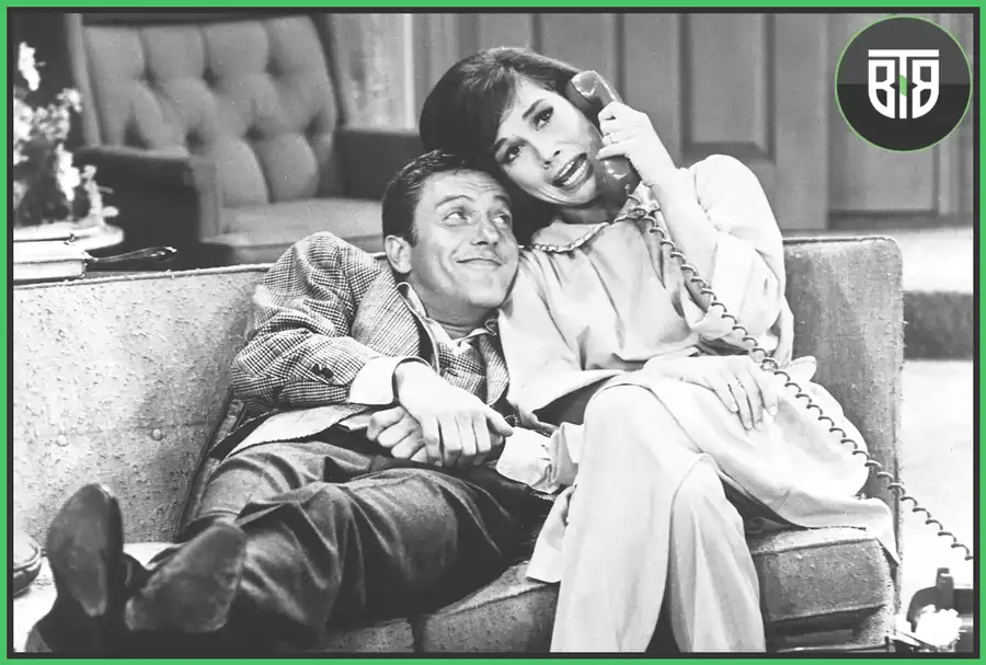 a man is with his girlfriend are laughing while talking on telephone in The Dick Van Dyke Show sitcom, imdb tv series