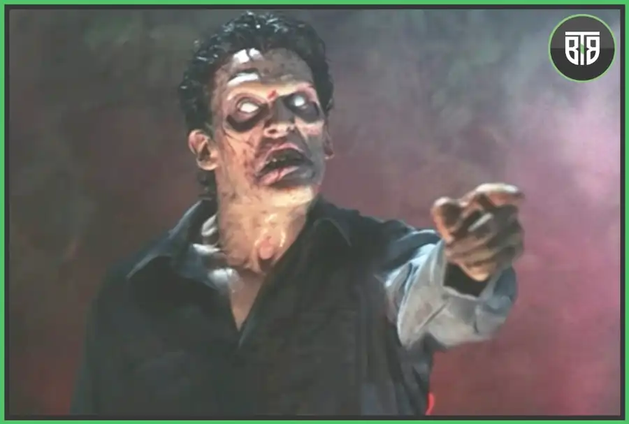 a man is pointing his finger to somewhere in Evil Dead 2 (1987), top 10 horror movies