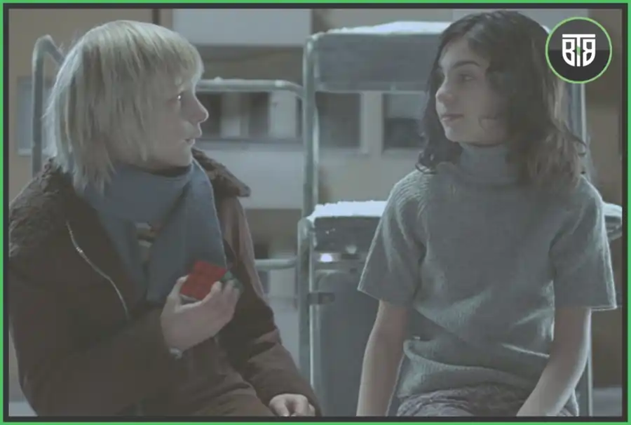 a boy and a girl are talking in a hospital in Let the Right One in 2008, slasher movies