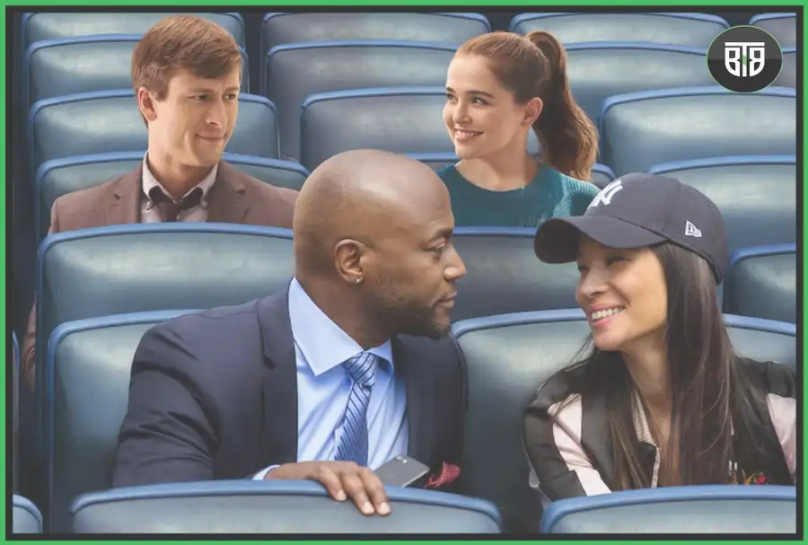 two couples are sitting besides and watching movie Set it up, funniest movies on netflix