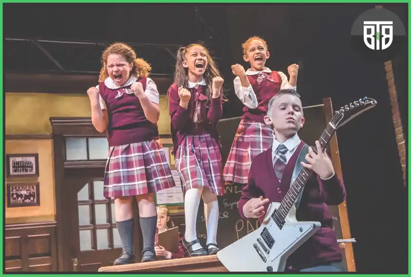 3 girls and one boy are playing instrument and singing in a movie School of Rock, funniest movie on hulu
