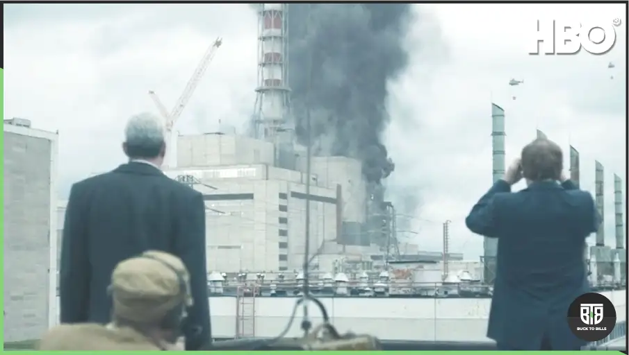 three men are viewing the scene of Chernobyl nuclear test