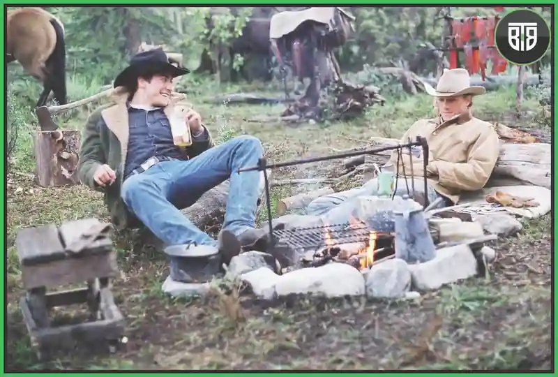 two men are doing camp fire in Brokeback Mountain (2005), emotional romantic movies