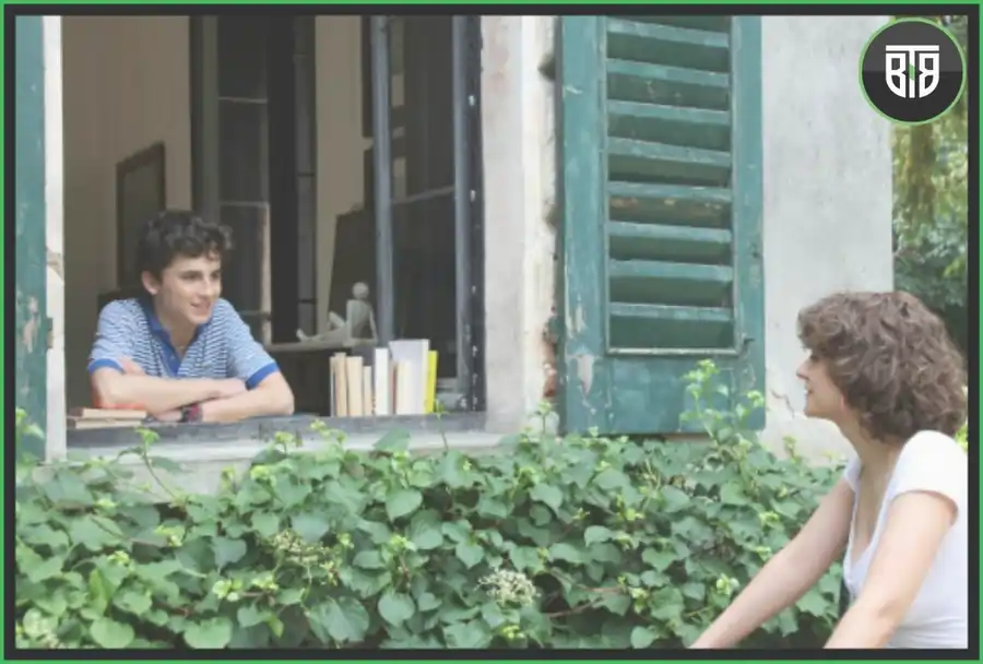 a boy is standing near window and a girl is on cycle in Call Me by Your Name (2017) sad romance movies on netflix