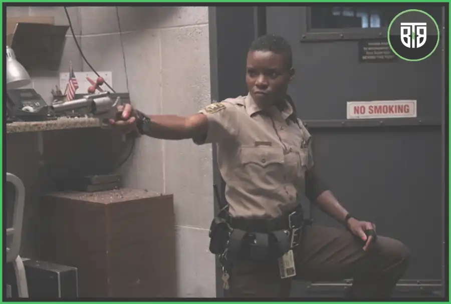 a lady is holding a gun in Copshop, best shows on apple tv plus 2022