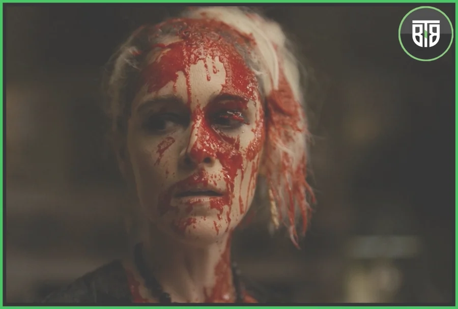 something reddish liquid is spilt on a lady face in Flux Gourmet, creepshow season2
