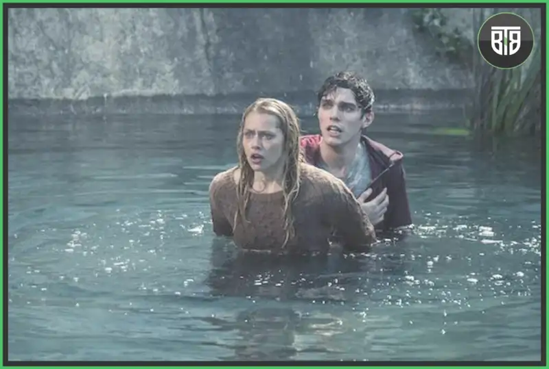 a boy is hiding behind a girl in a lake in a movie Warm Bodies, new horror comedy movies