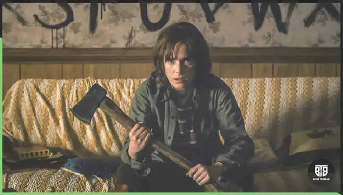 a boy is scared and holding an axe in a movie stranger things, best thriller movies on netflix 