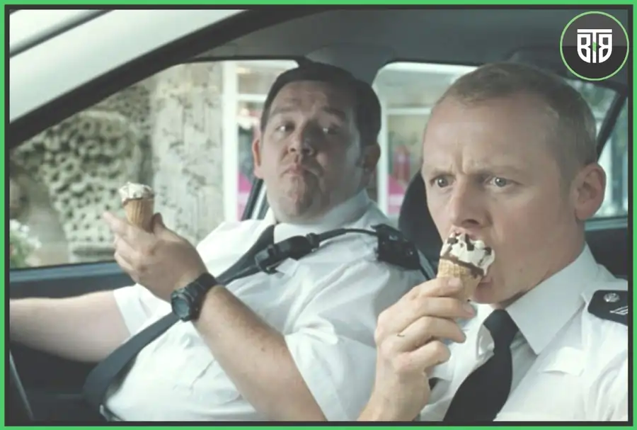 two policemen are eating ice cream in a car in Hot Fuzz (2007), funny movies on hulu
