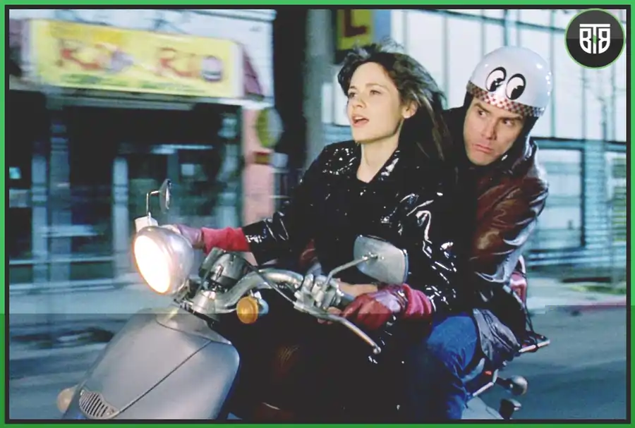 a lady is riding a bike and a man is sitting behind her in Yes Man - A 2008 Comedy/Romance Movie,  you changed my life full movie