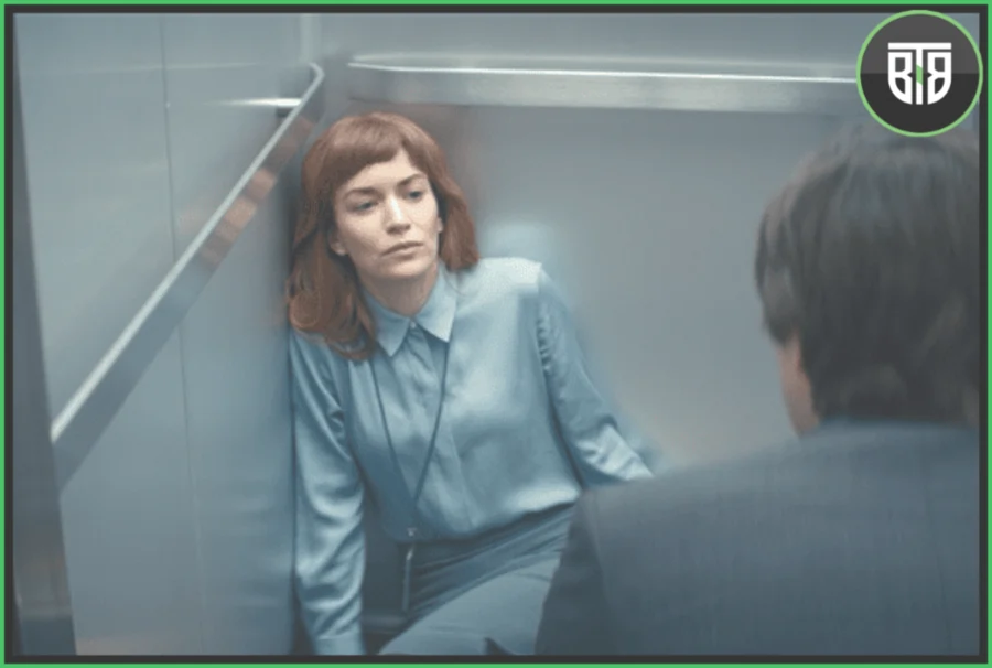 a lady is laying in a lift in Severance, shows to binge