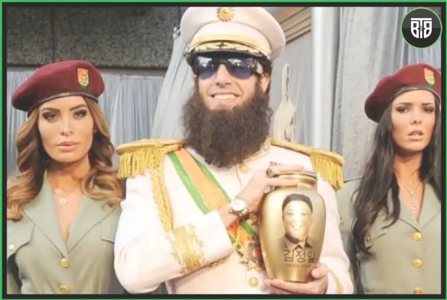 a man has won a trophy and two lady cops are standing besides him in The Dictator (2012) erotic comedy movies