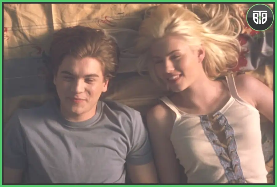 a couple is laying on a bed in The Girl Next Door (2004 film), good movies to watch on hulu