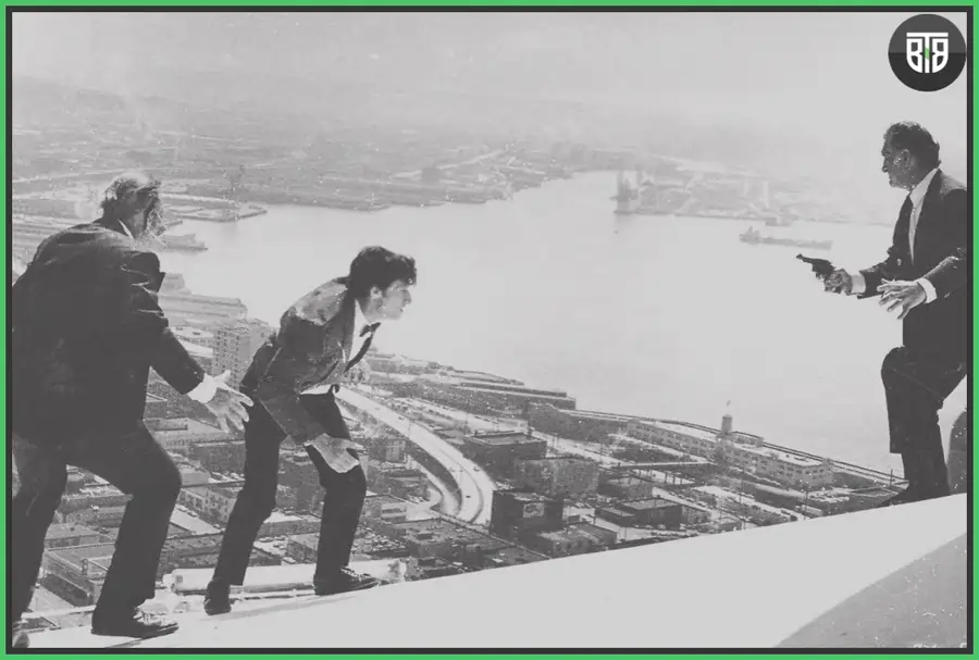 a man is poiting out a man in a movie The Parallax View - A1974 Thriller/Political thriller  Movie, the santa clause