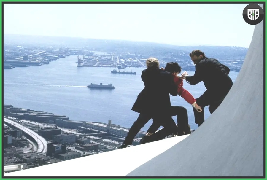three men are fighting on a tall building in The Parallax View (1974), national lampoon's christmas vacation