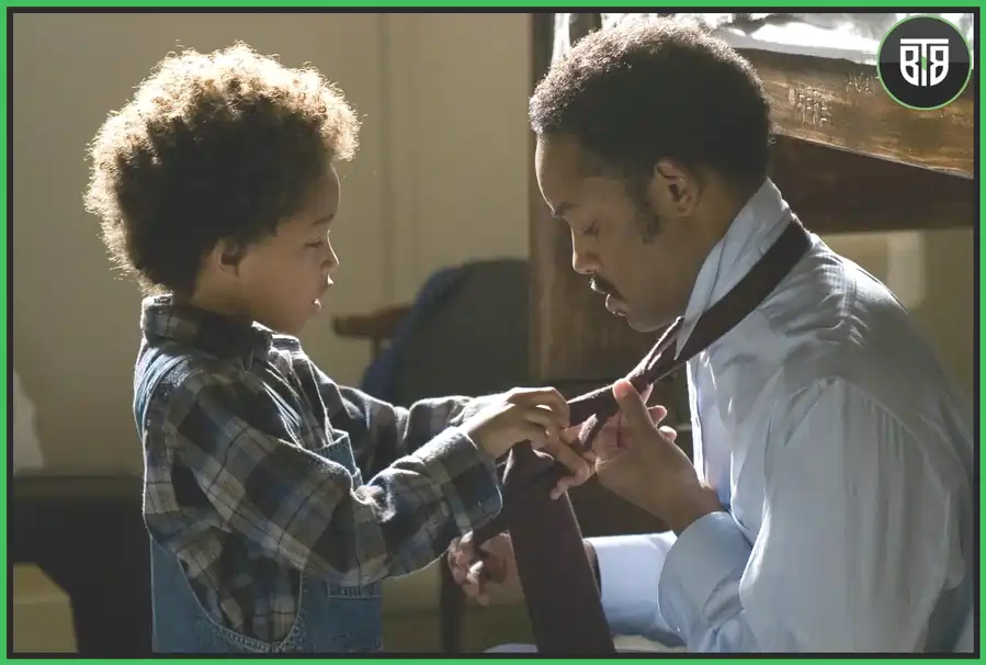 a small boy is teaching how to tie a tie in The Pursuit of Happyness - A 2006 Drama Movie life changing movies for students