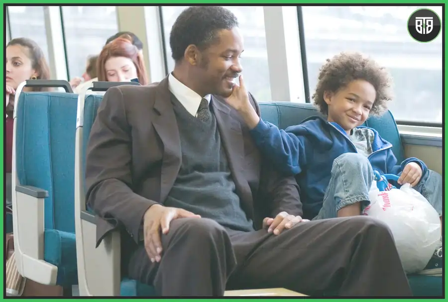 a small boy is touching the face of a man in The Pursuit of Happiness (2006), top life changing movies