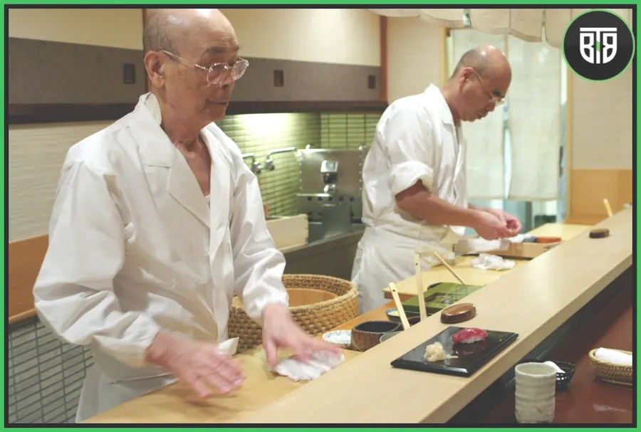two persons are preparing sushi in Jiro Dreams of Sushi Documentary, best business documentaries